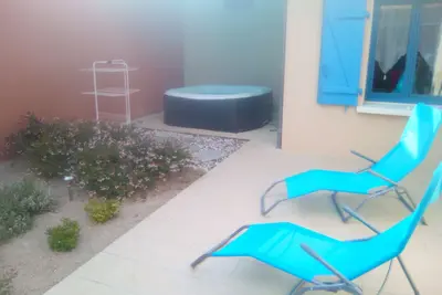 Image de Gîte chaleureux avec jacuzzi