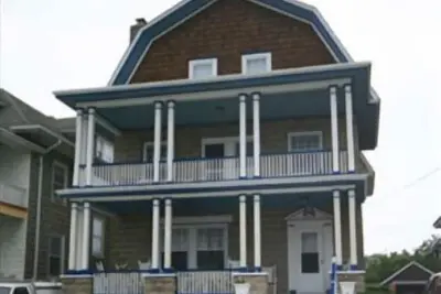 Image de A Classic Cape May beach house centrally located, beach block, with a large front porch.