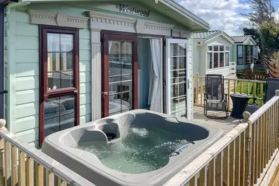 Image de Beautifully located overlooking Luce Bay and with the added bonus of a hot tub.