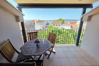 Image de Appartement de vacances avec jardin et climatisation