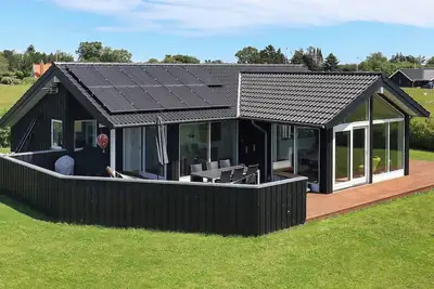 Image de Maison de vacances pour 9 a Otterup-By Traum
