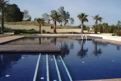 Image de \"Casa en la playa con piscina y port Aventura\" avec piscine partagée, climatisation et Wi-F