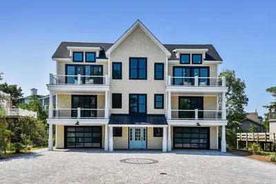 Image de Exceptional beach home located just steps from the beach front in beautiful family friendly Ocean Village, one of North Bethany’s most sought after private gated communities!