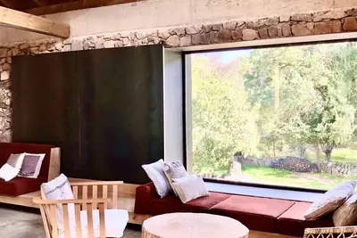 Renovated stone barn with terrace overlooking the countryside