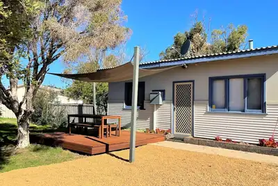 Image de Welcome to the Blue Beach House, a quaint beach shack and beautiful ocean front property in an exclu