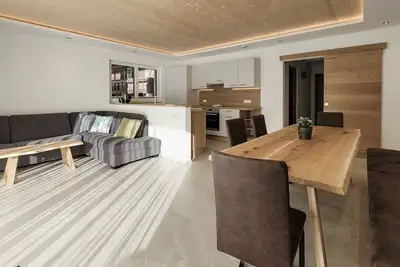 Image de 80m² modern vacation apartment with terrace, free bathing lake, 100m to the ski area
