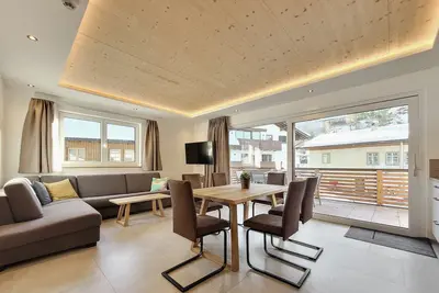 Image de 80m² modern vacation apartment with balcony, free bathing lake, 100m to the ski area
