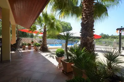 Image de Agréable appartement pour 7 personnes avec piscine, Wifi, climatisation, Tv, patio et parking