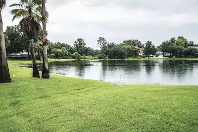 Image de Luxe Townhome Retreat | Golf Resort & Lake View | Spacious 3br with Workspaces & Screened Patio