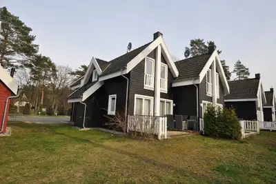 Image de Luxury wooden house with sauna and fireplace - only approx. 500 m to the Baltic Sea