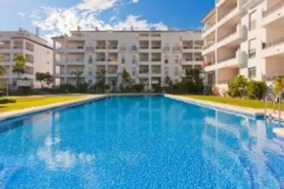 Image de Appartement \"Miraflores\" avec vue partielle sur la mer, piscines partagées et climatisation