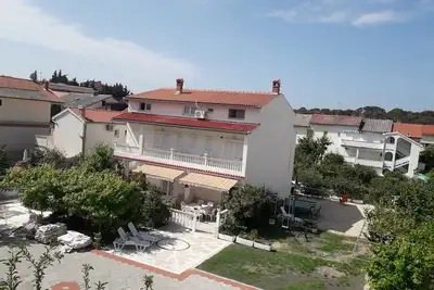 Image de The apartment Tina with Balcony to 8 p. garden with Pool, excellent location