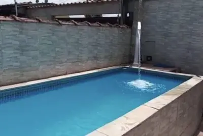 Image de House with pool near waterfall