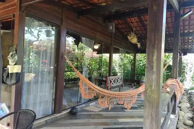 Image de Charmosa casa com churrasq. na praia de Camburí
