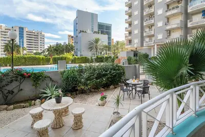 Image de The Retreat - Appartement avec jardin, piscine partagée et climatisation