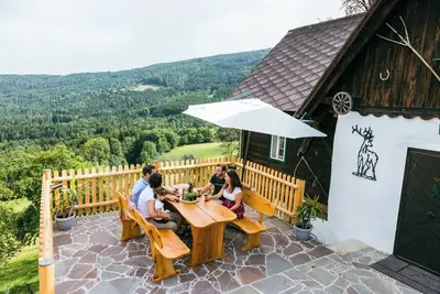Image de Maison de vacances 'Connyhaus St Oswald Ob Eibiswald' avec terrasse privée, Wi-Fi et climatisation