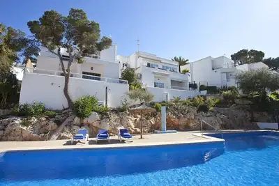 Image de Bungalow Playa D'or, Delante de la Playa con Wifi, A/A y Piscina Comunitaria