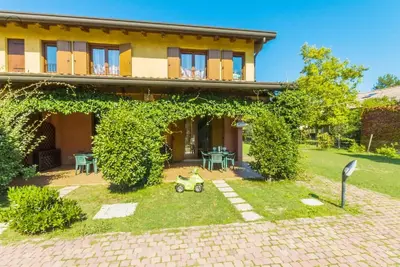 Image de Maison de vacances Bibione pour 1 - 6 personnes avec 2 chambres Ă coucher - Maison mitoyenne