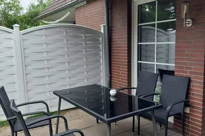 Image de Maison de vacances Butjadingen pour 1 - 6 personnes avec 3 chambres à coucher - Maison de vacances