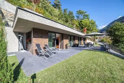 Image de Chalet \"Residenz - Riad\" avec vue sur les montagnes et bain à remous