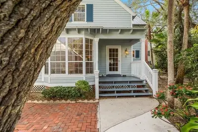 Beautiful cottage nestled amongst trees and five minute walk to beach