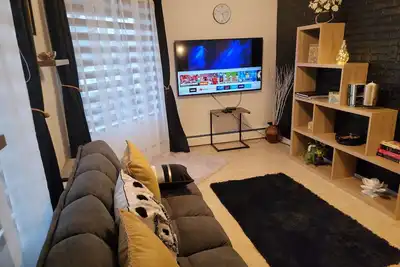 Image de Appartement charmant et confortable, proche de l'autoroute, wifi, netflix
