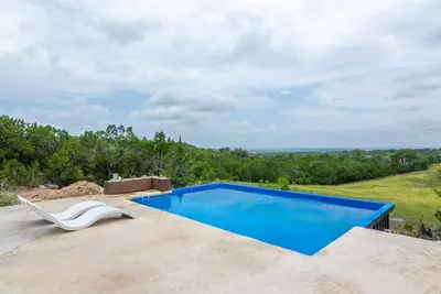 Image de Private container pool with pond and hot tub with views