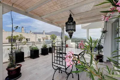 Image de Apartamento \"Del Paraíso\" avec vue sur les montagnes, piscine partagée et terrasse privée