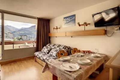 Image de À 100m des pistes de ski, 3ème étage, balcon, télévision, casier à ski, 24m², Les Menuires