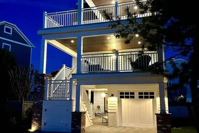Image de 'Point of View' This Newly purchased and renovated single family home located in Cape May's Prestigious Poverty Beach area.