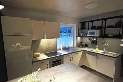 Image de Maison de vacances \"Ferienhaus am See\" près du lac avec jardin et terrasse