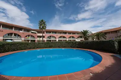 Image de Arinella - Studio avec piscine vue mer Ă 2 min Ă pied de la plage