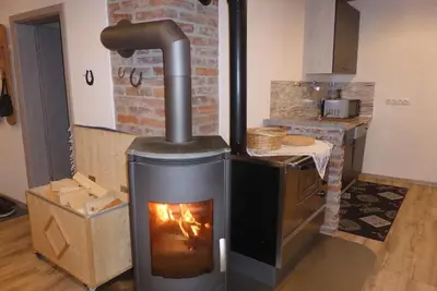 Image de Cozy vacation home (70 sqm) with fireplace and infrared sauna for up to 5 people