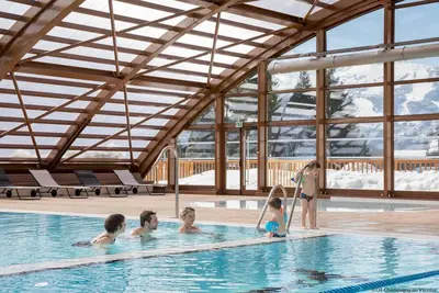 Image de À 300m des pistes de ski, Rez-de-chaussée, vue montagne, terrasse, parking, télévision, 95m²
