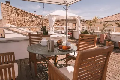 Image de Grand appartement de charme au coeur de Nîmes avec Rooftop spectaculaire, garage