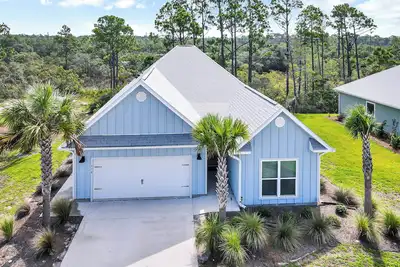 Image de \"Coral Sunsets\" Is A 4bd W/Mother-In-Law Suite! Option To Rent Golf Cart, Pet Friendly!