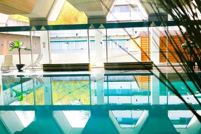 Image de Appartement \"RuheZeit\" avec vue sur les montagnes, sauna et piscine partagés