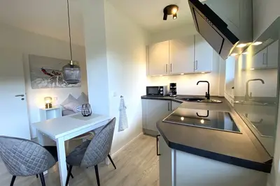 Image de New! Holiday apartment \"KursNord\" in the heart of GlĂĽcksburg