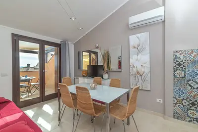 Image de Appartement de vacances \"C 306 Attico Puntavilla Mare\" avec vue sur mer