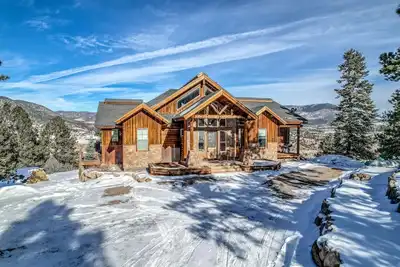 Image de Lodge-style home with striking mountain views, fireplaces, & hot tub