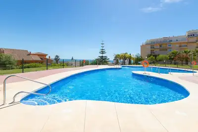 Image de Penthouse avec une vue sur la montagne, Vue sur la mer, Terrasse & Jardin