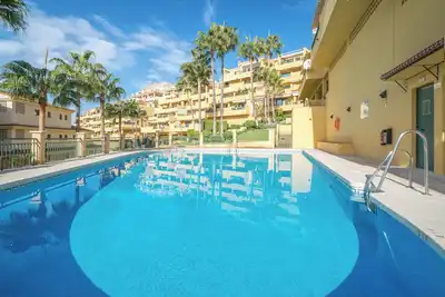 Image de Appartement de luxe à Torrequebrada avec piscine partagée et Wi-Fi