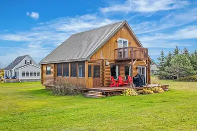 Image de Charming 3br cottage steps from white sand beaches