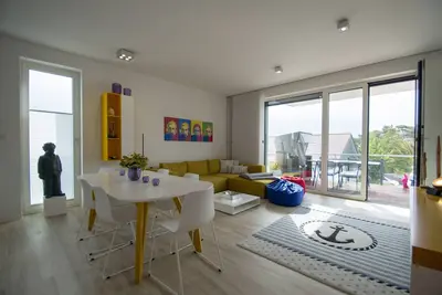 Image de Close to the beach, spacious, modern, with sauna - family apartment on Rügen