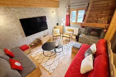 Image de Duplex spacieux avec terrasse, piscine couverte et cheminée à Samoëns