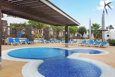 Image de Appartement de vacances \"Playa Flamingo 37\" avec piscine partagée, climatisation et Wi-Fi