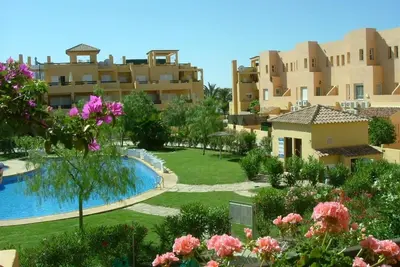 Image de Appartement confortable à El Faro avec piscine, terrasse, balcon, climatisation et Wi-Fi