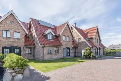 Image de House NorderstraĂźe 55, Whg. 9 - Exclusivity. Comfort. View of the dunes.