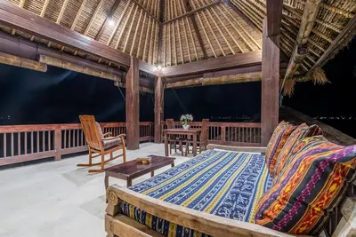 Image de Deluxe Room with Balcony and Ocean View | The Village of Angels Resort