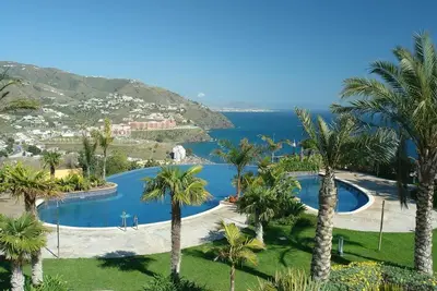 Image de Villa Fuentes avec vue sur la mer, piscine partagée et Wi-Fi.